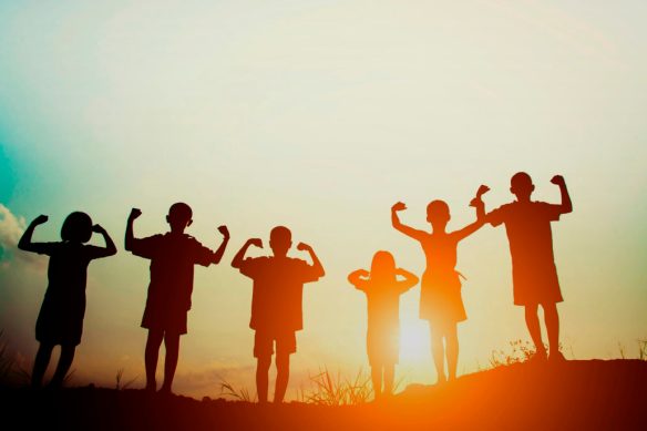 silhouette of a happy children and happy time with sunset.